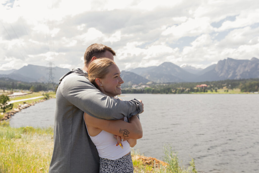Couples surprise proposal photos at Lake Estes in Estes Park, Colorado 